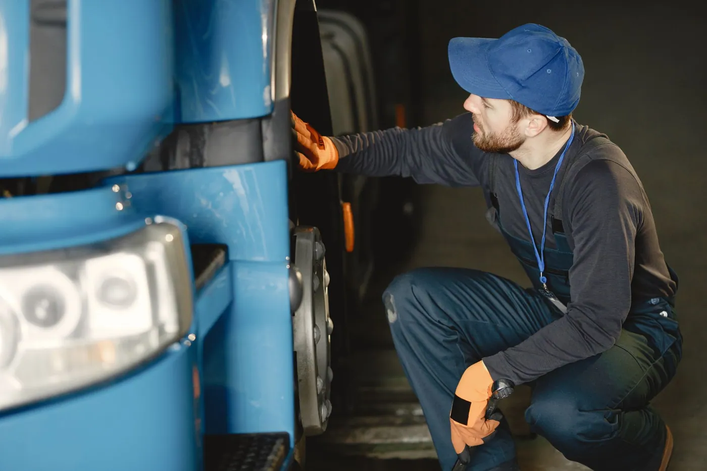 A licensed pest control technician inspecting a home for rodent entry points